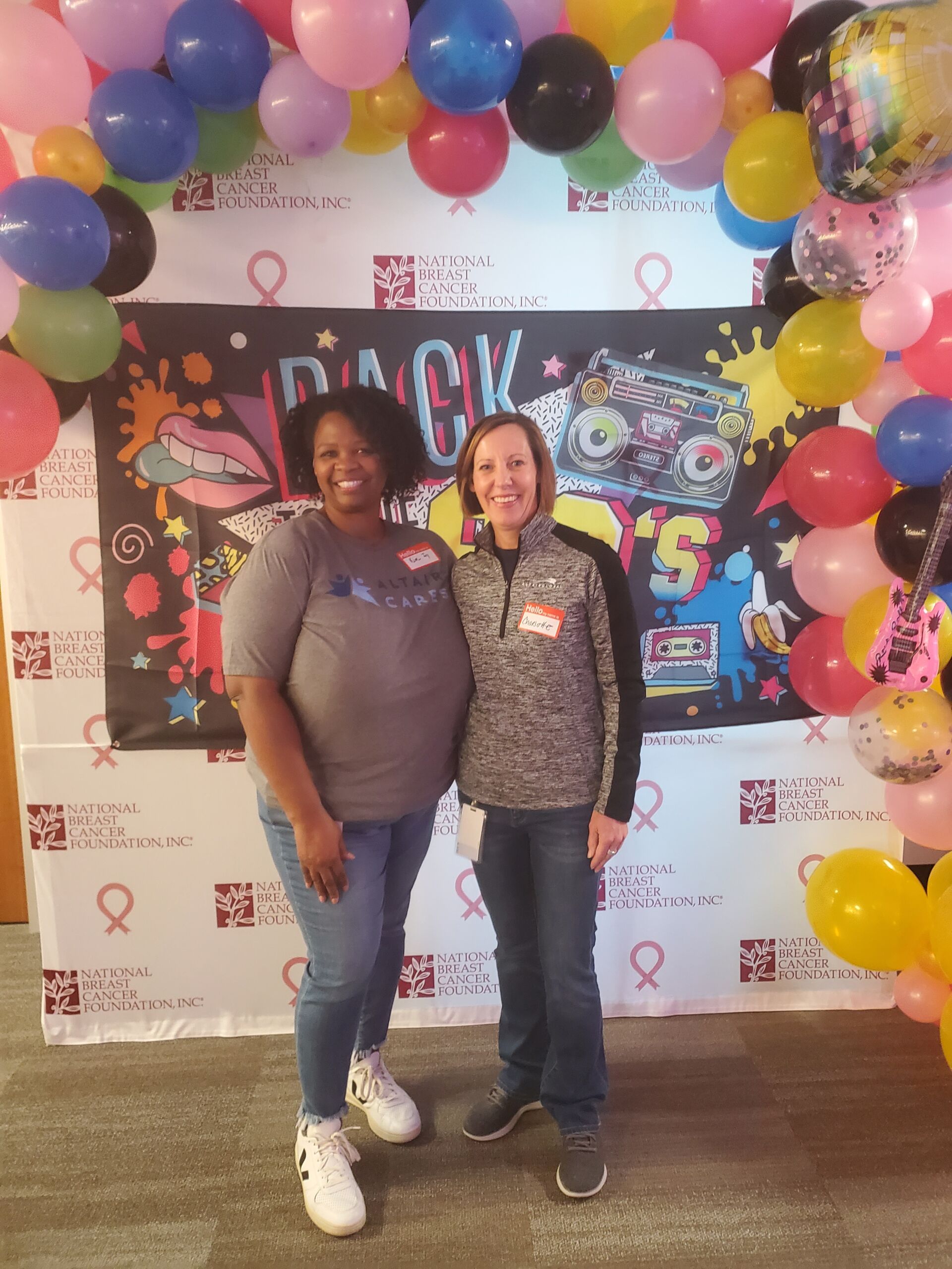Altair Global team members Kim Ivy and Charlotte Reeves Volunteering