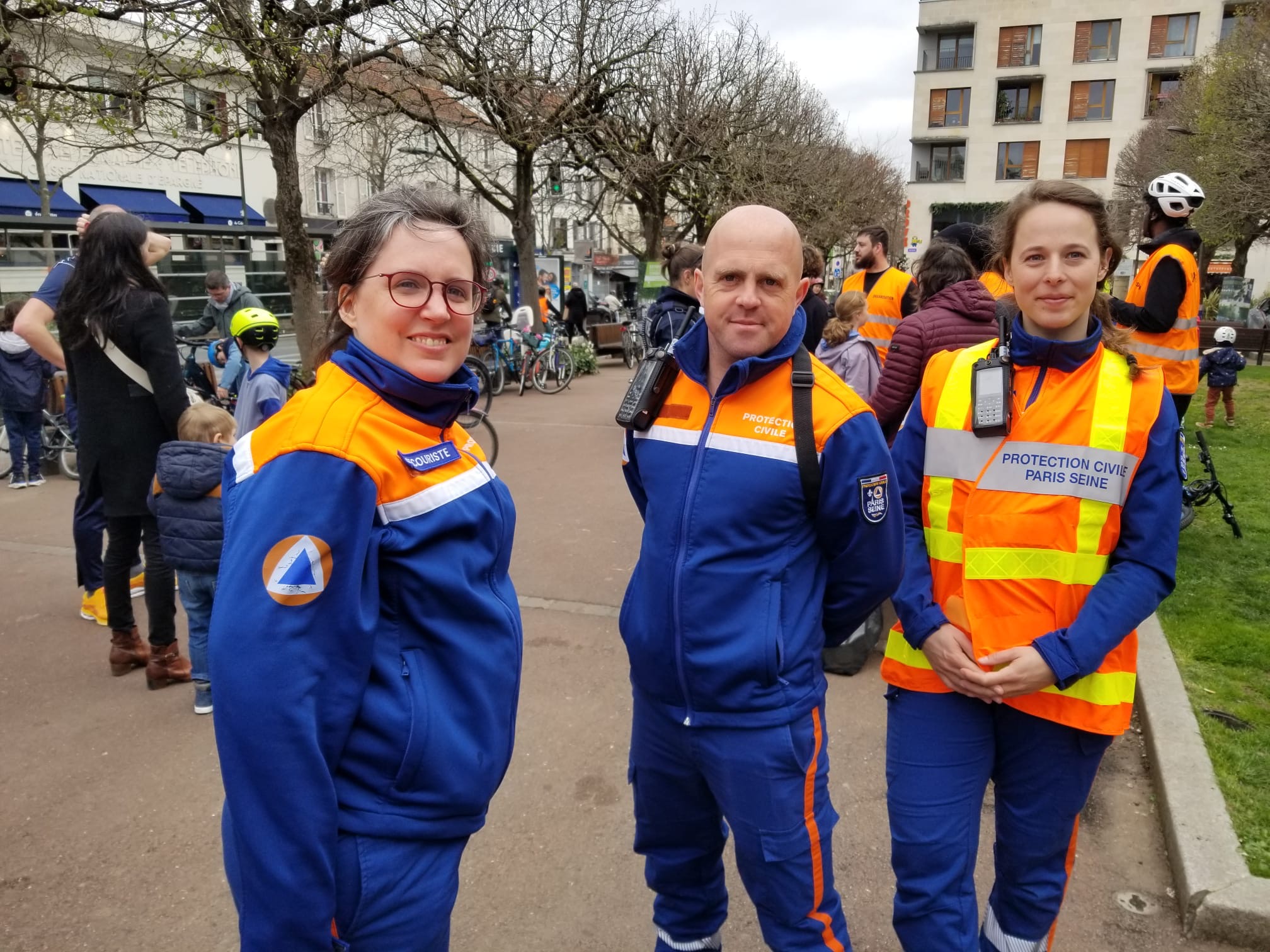 Clotilde, team member at Altair Global, standing alongside colleagues while volunteering for Protection Civile